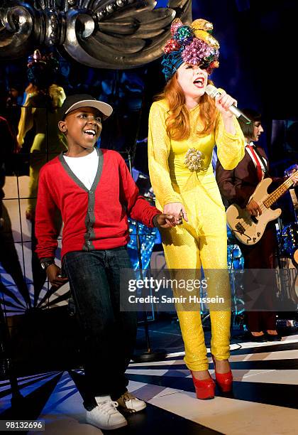 Paloma Faith performs with a boy from the crowd at the Shepherds Bush Empire on March 29, 2010 in London, England.