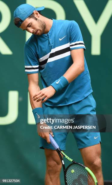 Karen Khachanov from Russia reacts during his match against Roberto Bautista Agut from Spain at the ATP Gerry Weber Open tennis tournament in Halle,...