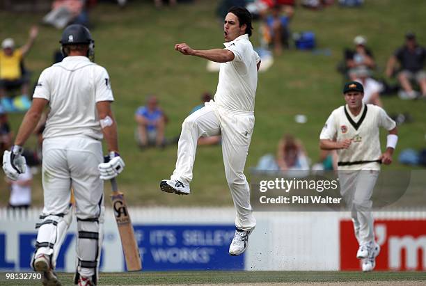 Mitchell Johnson of Australia celebrates bowling Tim McIntosh of New Zealand during day four of the Second Test match between New Zealand and...