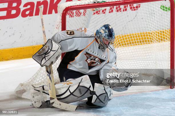 Goaltender Dan Ellis of the Nashville Predators defends the net against the Florida Panthers at the BankAtlantic Center on March 29, 2010 in Sunrise,...