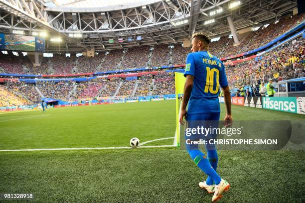 Brazil's forward Neymar takes a corner during the Russia 2018 World Cup Group E football match between Brazil and Costa Rica at the Saint Petersburg...