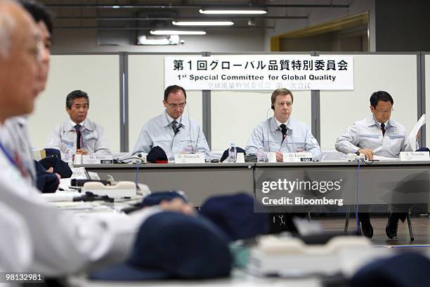 Akio Toyoda, president of Toyota motor Corp., right, takes part in the first meeting of the Special Committee for Global Quality in Toyota City,...