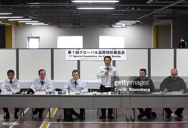 Akio Toyoda, president of Toyota motor Corp., standing third from right, speaks during the first meeting of the Special Committee for Global Quality...