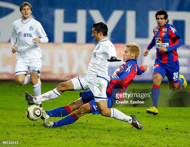 Keisuke Honda of PFC CSKA Moscow battles for the ball with Aleksandr Samedov of FC Dynamo Moscow during the Russian Football League Championship...