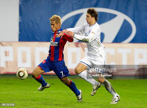 Keisuke Honda of PFC CSKA Moscow battles for the ball with Alexandru Epureanu of FC Dynamo Moscow during the Russian Football League Championship...