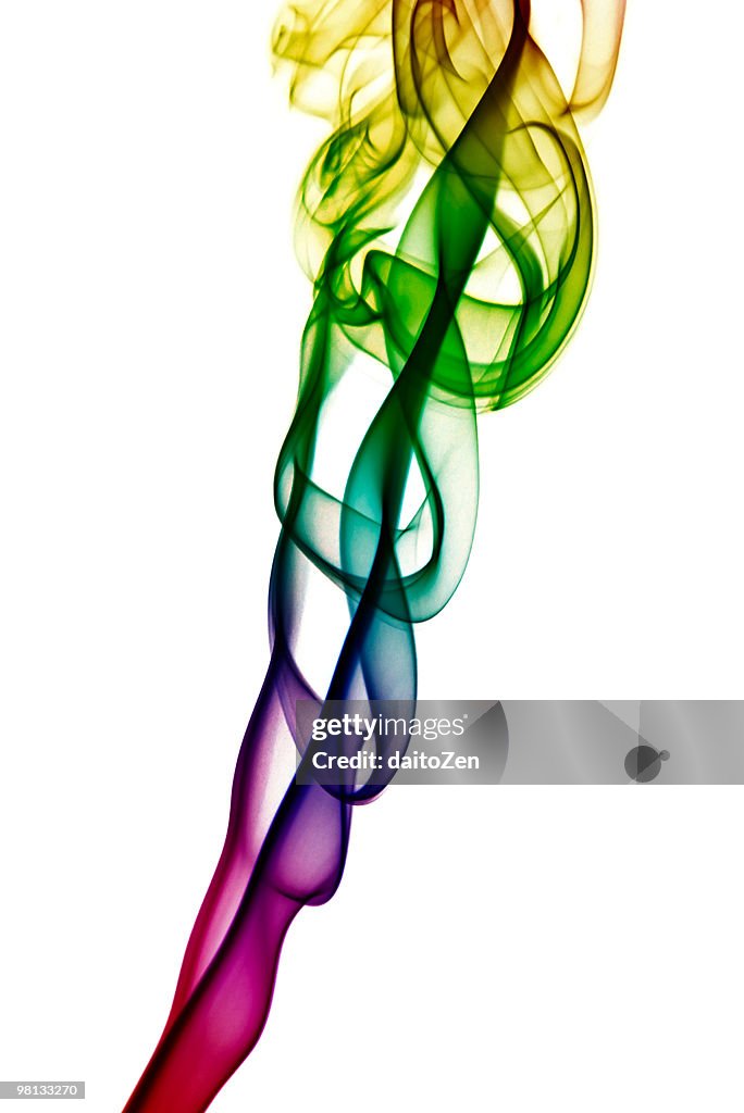 Multi-coloured smoke on white background