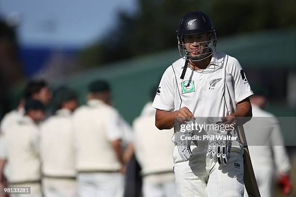 Ross Taylor of New Zealand walks off the field after being caught by Brad Haddin of Australia during day four of the Second Test match between New...