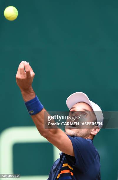 Roberto Bautista Agut from Spain serves the ball to Karen Khachanov from Russia during their match at the ATP Gerry Weber Open tennis tournament in...