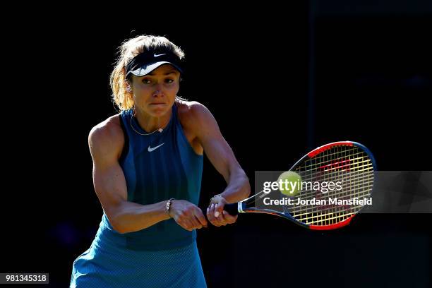 Elina Svitolina of Ukraine plays a backhand during her quarter-final match against Mihaela Buzarnescu of Romania during Day Seven of the Nature...