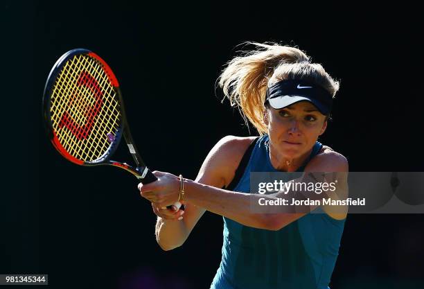 Elina Svitolina of Ukraine plays a backhand during her quarter-final match against Mihaela Buzarnescu of Romania during Day Seven of the Nature...