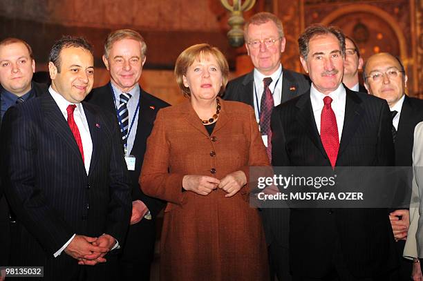 German Chancellor Angela Merkel visits the Hagia Sophia museum with Turkish Culture Minister Ertugrul Gunay and EU Affairs Minister and chief...