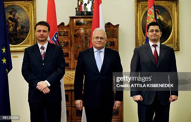 Foreign Ministers Gordan Jandrokovic of Croatia , Peter Balazs of Hungary and Vuk Jeremic of Serbia stand in front of their national flags in the...