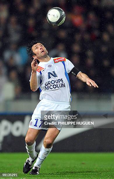 Montpellier's midefielder Romain Pitau eyes the ball during the French L1 football match Lille vs Montpellier, on March 28, 2010 at the Lille...