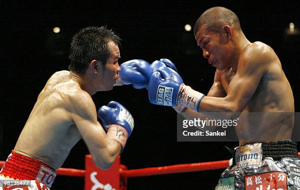 Pongsaklek Wonjogkam of Thailand and Koki Kameda of Japan during the WBC flyweight title bout at Ariake Colosseum on March 27, 2010 in Tokyo, Japan....