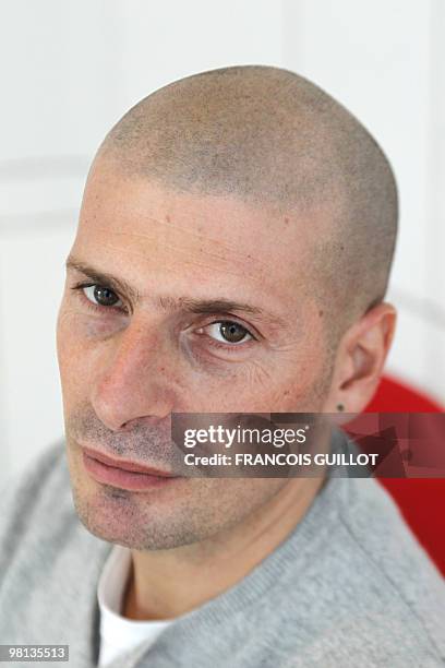 Member of pioneering French rap group IAM, Akhenaton poses on March 22, 2010 in Paris. AFP PHOTO FRANCOIS GUILLOT