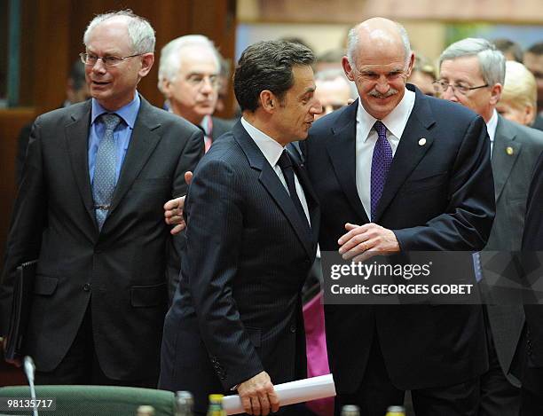 European Council President Herman Van Rompuy, French President Nicolas Sarkozy and Greek Prime Minister George Papandreou arrive for a working...
