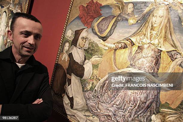 Le Japonais de Paris Foujita s'expose à Reims entre +enfer et paradis+". Reims Fine Arts museum curator, David Liot, poses on March 25 before a...