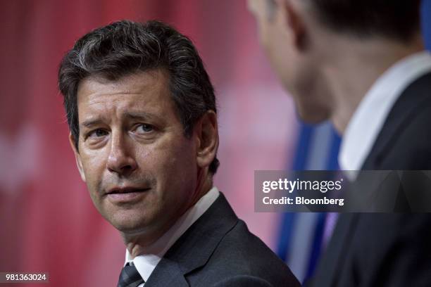 Dan Hart, president of Virgin Orbit LLC, center, listens during a panel discussion at the SelectUSA Investment Summit in National Harbor, Maryland,...