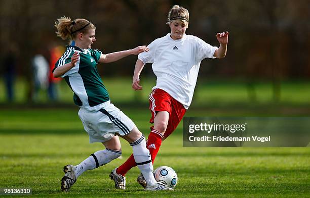 Henrike Schroedel of Brandenburg battles for the ball with Caroline Asteroth of Rheinland during the decision match between Rheinland and Brandenburg...