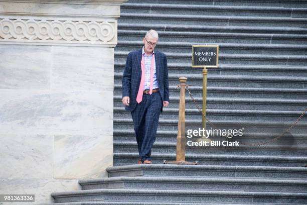Rep. Trey Gowdy, R-S.C., walks down the House steps in the rain after the final vote of the week on Friday, June 22, 2018. Congress goes home for the...