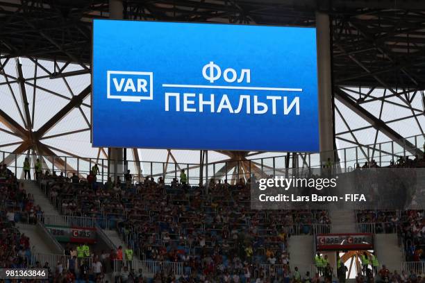 The big screen inside the stadium shows that a VAR review has resulted in Iceland being awarded a penalty during the 2018 FIFA World Cup Russia group...