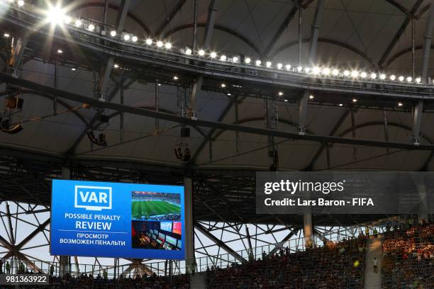 The big screen inside the stadium shows that a VAR review is in place which resulted in Iceland being awarded a penalty during the 2018 FIFA World...