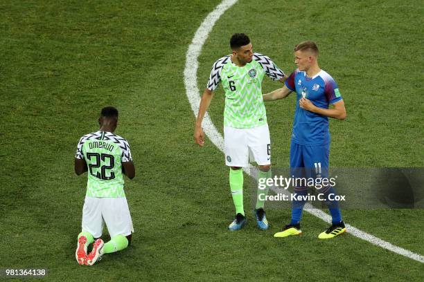 Leon Balogun of Nigeria consoles Alfred Finnbogason of Iceland following Iceland's defeat in the 2018 FIFA World Cup Russia group D match between...