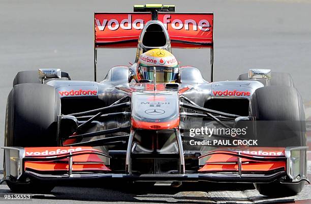Lewis Hamilton of Britain powers his McLaren-Mercedes through a corner during the first practice session to Formula One's Australian Grand Prix in...