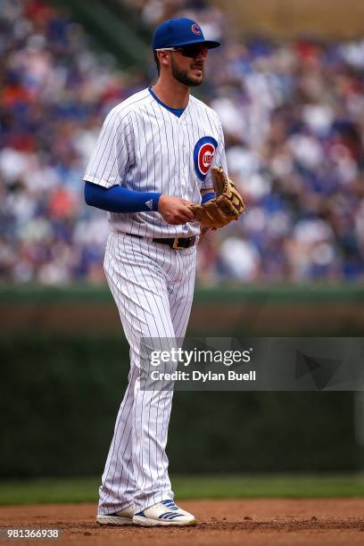 Kris Bryant of the Chicago Cubs plays third base in the first inning against the Los Angeles Dodgers at Wrigley Field on June 20, 2018 in Chicago,...