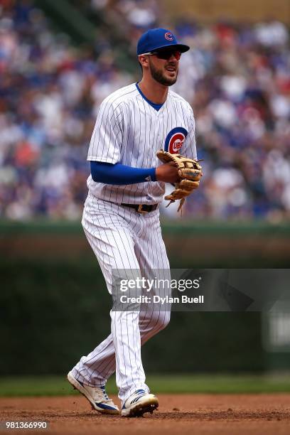 Kris Bryant of the Chicago Cubs plays third base in the first inning against the Los Angeles Dodgers at Wrigley Field on June 20, 2018 in Chicago,...