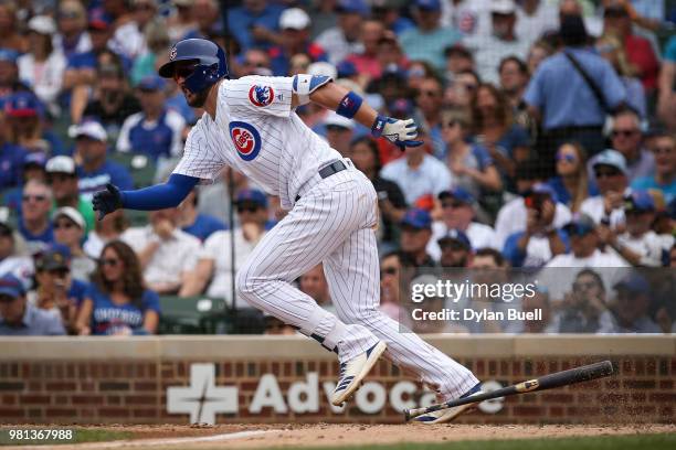 Kris Bryant of the Chicago Cubs hits a single in the fifth inning against the Los Angeles Dodgers at Wrigley Field on June 20, 2018 in Chicago,...