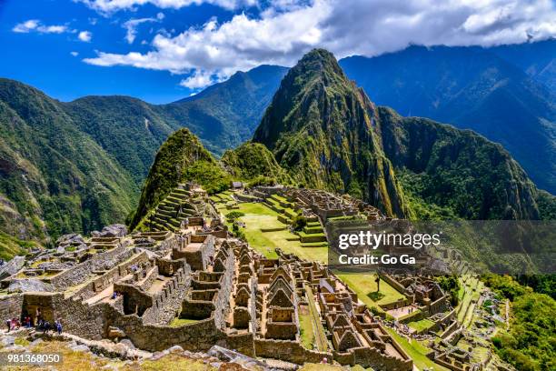 ruins of machu picchu, inca trail, andes, peru - peru mountains stock-fotos und bilder