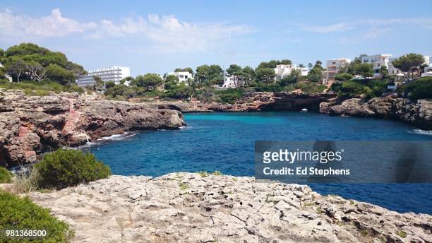 mallorca - cala d'or - beach at cala d'or stock pictures, royalty-free photos & images