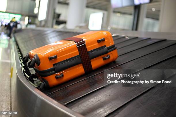 baggage collection - luggage stock-fotos und bilder