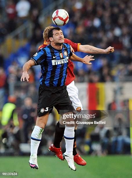 Dejan Stankovic of Inter and John Arne Riise of Roma in action during the Serie A match between AS Roma and FC Internazionale Milano at Stadio...