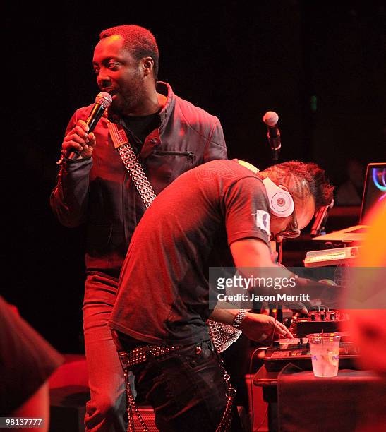 Will.I.Am and apl.de.ap perform during Bacardi's official concert after party for the Black Eyed Peas at Club Nokia on March 29, 2010 in Los Angeles,...
