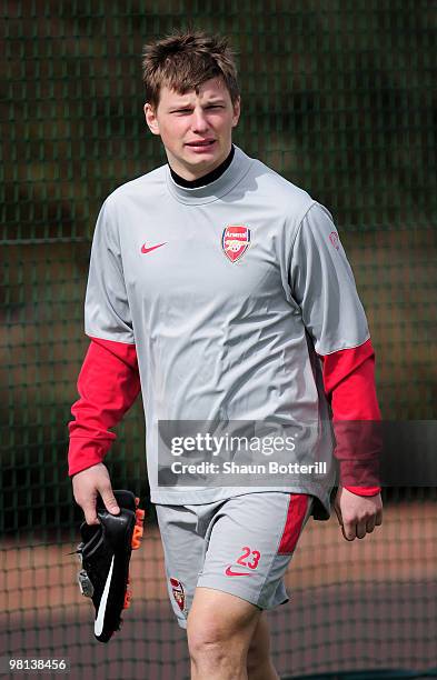 Andrey Arshavin of Arsenal walks out during Arsenal training ahead of their UEFA Champions League quarter final first leg match against Barcelona at...