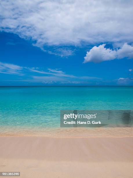 clouds on sky over sea, sint maarten - isla de san martín fotografías e imágenes de stock