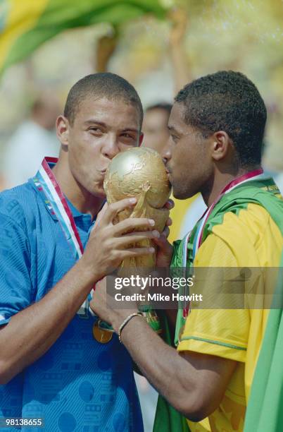 Ronaldo of Brazil kisses the trophy after winning the1994 FIFA World Cup Final against Italy on 17 July 1994 played at the Rose Bowl in Pasadena,...