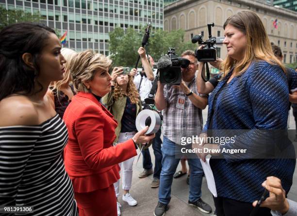 Former Houston TexansÊcheerleader Angelina Rose and attorney Gloria Allred deliver a letter and a roll of duct tape to a representative of the NFL...