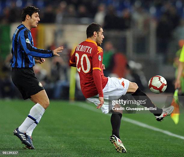 Javier Zanetti of Inter and Simone Perrotta of Roma in action during the Serie A match between AS Roma and FC Internazionale Milano at Stadio...