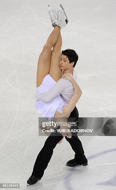 Canada's Tessa Virtue and Scott Moir perform their free dance during the Ice Dance competition at the World Figure Skating Championships on March 26,...