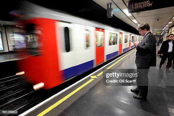 London Underground train arrives in St James's Park station on March 30, 2010 in London, England. London Underground workers are to be balloted for...