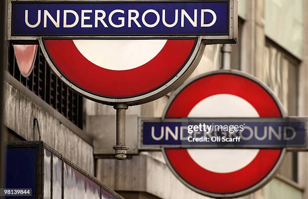 London Underground signs hang outside St James's Park station on March 30, 2010 in London, England. London Underground workers are to be balloted for...