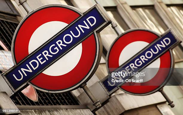 London Underground signs hang outside St James's Park station on March 30, 2010 in London, England. London Underground workers are to be balloted for...