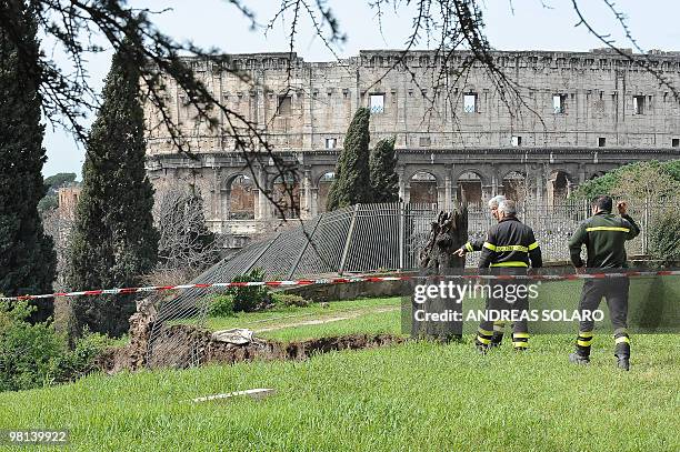 Firefighters work on a collapsed area of the Trajan gallery located at the ancient Domus Aurea site , built by Roman emperor Nerone, in front of the...