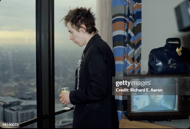 Johnny Rotten from The Sex Pistols posed in a hotel room on their final tour of the USA in January 1978