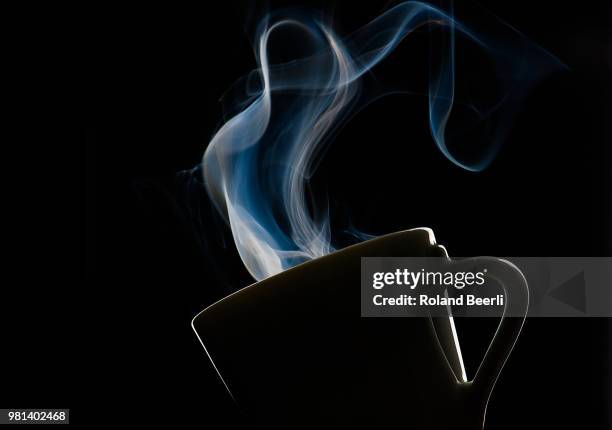 hot espresso - steam black background stock pictures, royalty-free photos & images