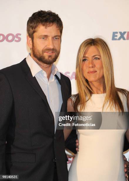 Actress Jennifer Aniston and actor Gerard Butler attend 'Exposados' photocall, at the Villamagna Hotel on March 30, 2010 in Madrid, Spain.