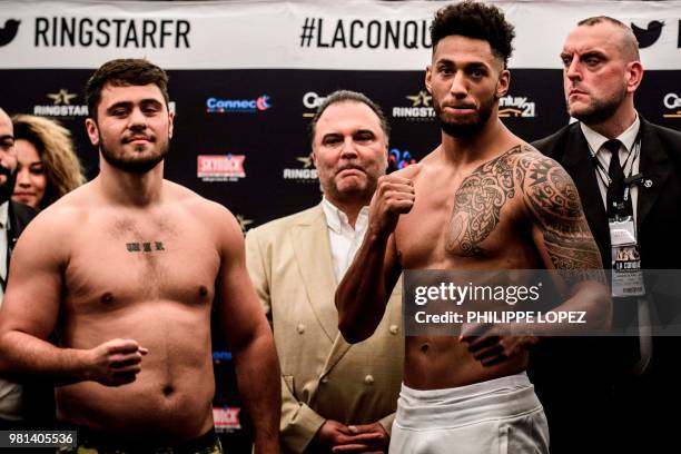 France's Tony Yoka and England's Dave Allen are pictured after the official weighing in Paris on June 22, 2018 on the eve of their International...